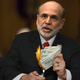 Calling it "basically no more than five rectangular strips of paper," Fed chairman Ben Bernanke illustrates how much "$200" is actually worth.